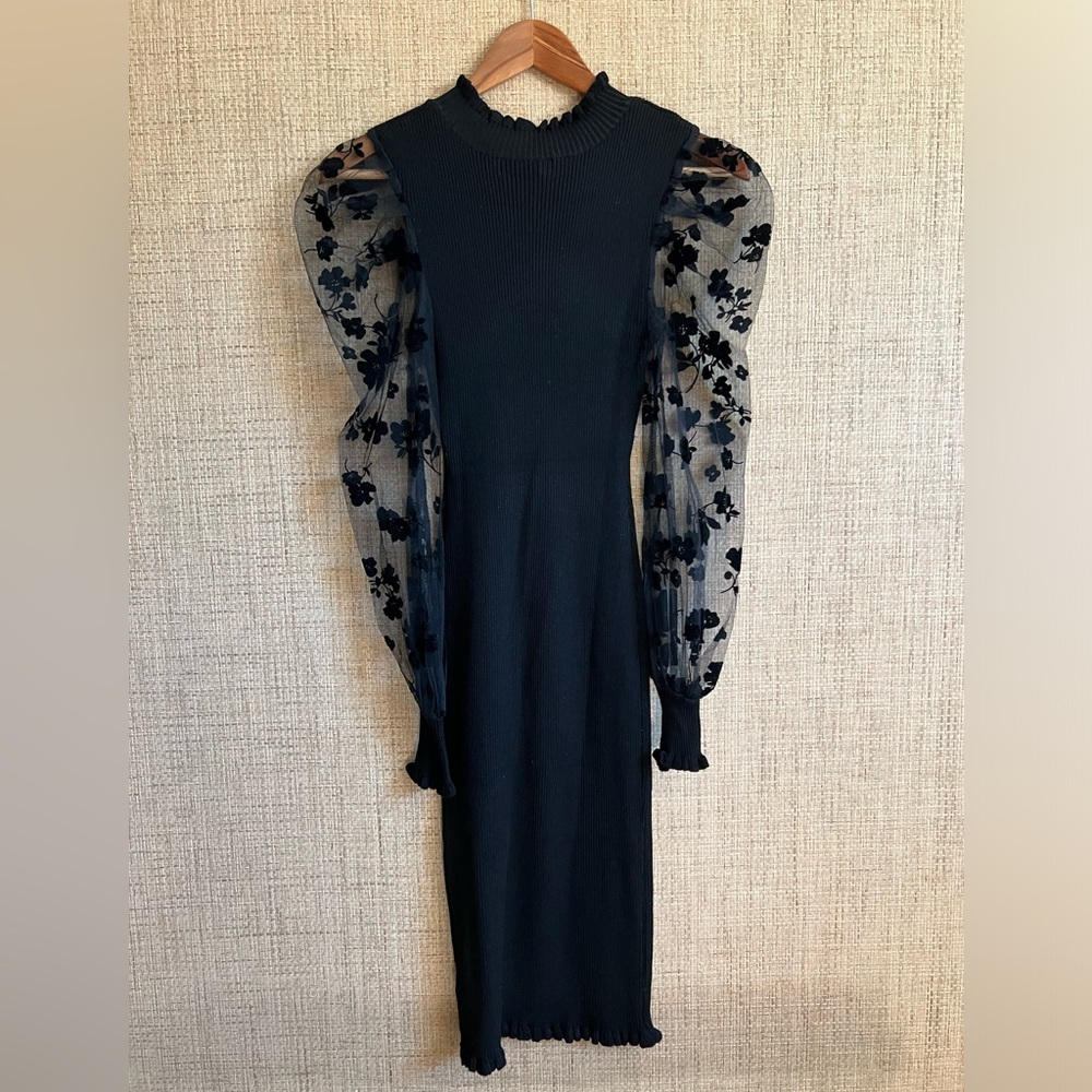 Black knit midi dress with mesh sleeves